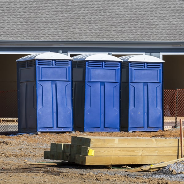 how often are the portable restrooms cleaned and serviced during a rental period in Hamilton